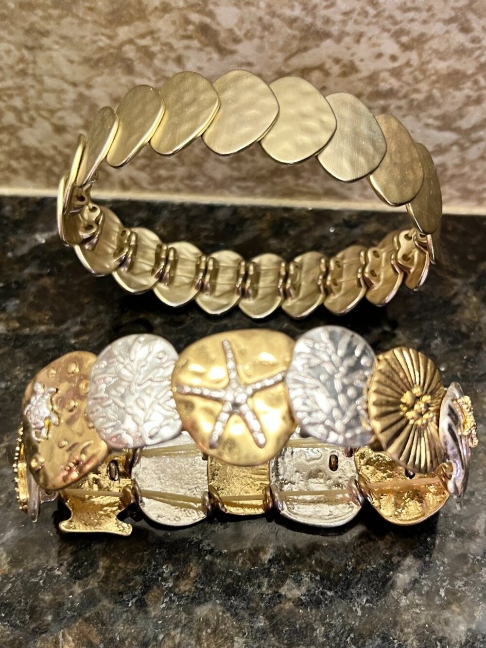 Lot of 2 Stretch Bracelets - LOFT gold-tone hammered disc & two-tone Sea Life